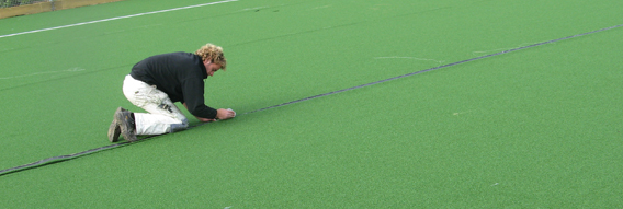 Advantage carrying out repair work on an astroturf pitch