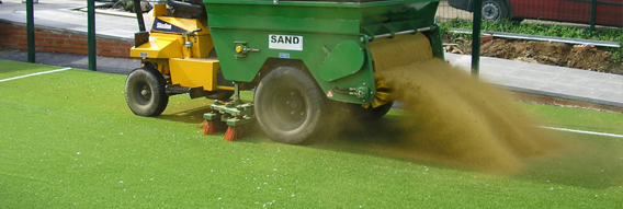 Adding sand infill to an astroturf pitch