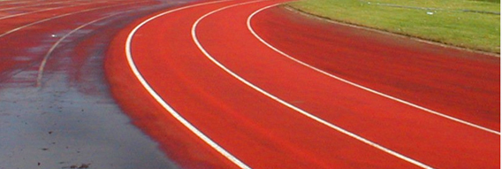 Spray cleaning operation on an athletics track